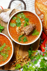 Traditional Georgian soup kharcho with walnuts.top veiw