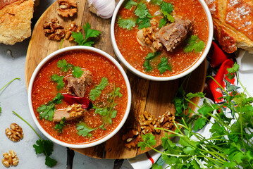 Traditional Georgian soup kharcho with walnuts.top veiw