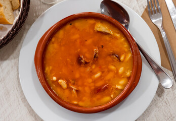 Stewed white beans with sausages, popular dish of spanish cuisine