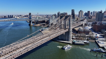 Fototapeta premium Brooklyn Skyline At Manhattan In New York United States. Highrise Buildings Scenery. Brooklyn Bridge Landscape. Brooklyn Skyline At New York United States. Traffic Background. 