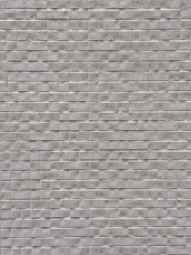 Abstract textured gray brick wall surface background