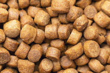 Dry pet food, for cats or dogs. Background texture