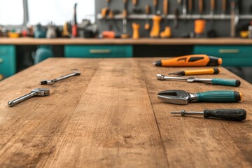 Tools arranged neatly on a wooden workbench in a bright workshop with a variety of equipment in the background