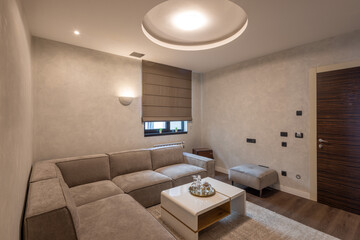 Modern hotel room with cozy sofa