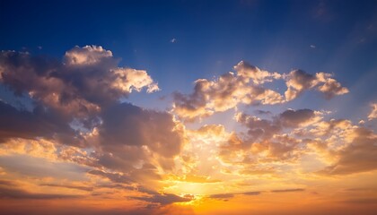 sunset sky vertical evening sky clouds with orange yellow sunlight in golden hour dusk sky in summer backgrounds
