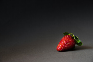 Fresh Ripe Strawberries on Dark Background