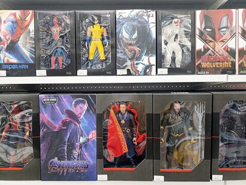 Collectible action figures display featuring marvel characters in store