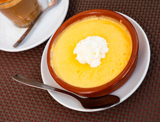 Delicious creamy mango mousse served for dessert in bowl