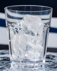 Ice cubes in a glass of water