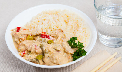 Chicken fillet red curry with jasmine rice. High quality photo