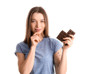 Young woman with sweet chocolate bar on white background