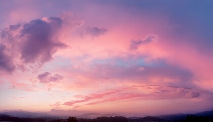 Fototapeta premium panorama of twilight pink sky in soft clouds in the sunset with pastel background and backdrop
