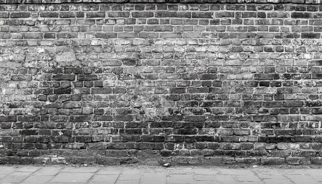 Fototapeta Aged brick wall.  Weathered texture.  Urban backdrop