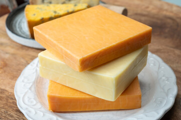 British cheeses collection, Scottish coloured and English matured cheddar cheeses