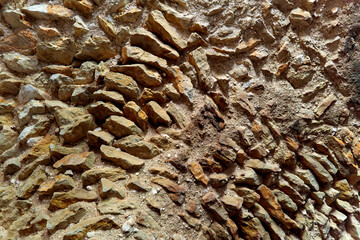 Fragment of stonework of an arched ceiling in an ancient building