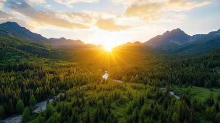 Obraz premium Golden hour sunlight illuminates serene valley surrounded by majestic mountains and lush forests