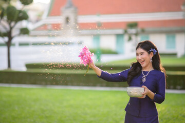 asian woman with Songkran festival