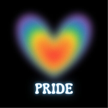 glowing rainbow heart with phrase "pride" written underneath 