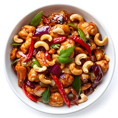 A delicious and appetizing bowl of chicken cashew stir-fry is presented on a white background for food photography.