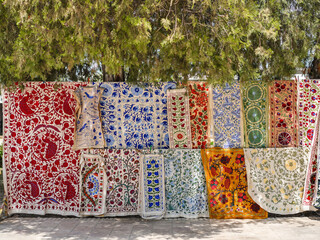 Carpet. Beautiful details of carpet hanging on the street selling as souvenirs from Uzbekistan. Common scenes to see in Uzbekistan.