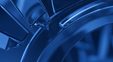 Close up view of interlocking gears bathed in a monochromatic blue light and shallow depth of field