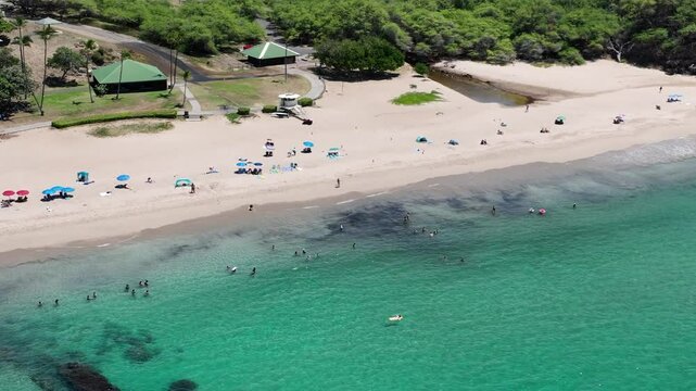 Aerial drone view Hapuna Beach zoom in rotate ccw