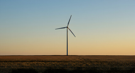 Obraz premium Wind Farm At Golden Hour With Pastoral Field At Twilight Time