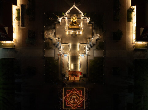 Lopburi, Thailand, April 12, 2025, Stunning aerial view of Puttha Sathan Lopburi at night capturing illuminated Buddha statue and surrounding architecture