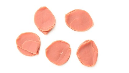 Pink sliced processed meat