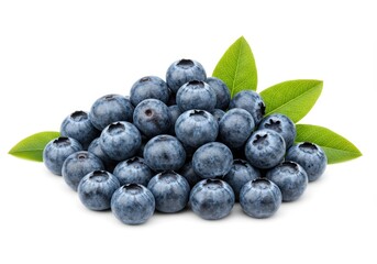 A pile of fresh blueberries with green leaves on a white background in a studio shot setting