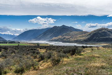 Surrounded by mountain ranges the extreme arid dry farming fields in the Rangitata Valley  in Canterbury NZ