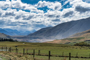 Surrounded by mountain ranges the extreme arid dry farming fields in the Rangitata Valley  in Canterbury NZ