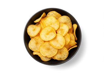 A top view of a black bowl filled with crispy golden potato chips on a white background studio shot