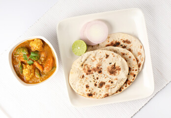 Indian food Tandoori roti or nan, Indian flat bread with Mix vegetable curry  