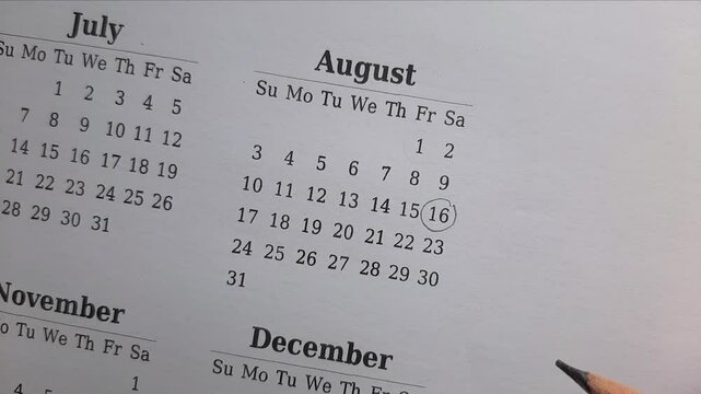 marking 16 August date on the calendar	
