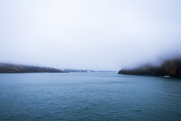 Neptune's Window is a narrow gap between two rock pillars, situated close east of Whalers Bay on the southeast side of Deception Island