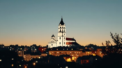 Obraz premium Serene Twilight Cityscape Church Cathedral Urban Skyline at Dusk