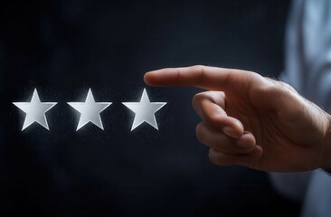 Hand selecting a star rating in a dark environment, symbolizing feedback and evaluation