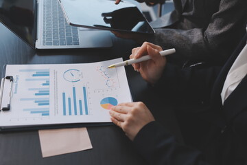 Accounting company provide finance and taxation planning for profitable cash flow, Auditor and accountant team working in office, analyze financial data and accounting record with calculator.Insight