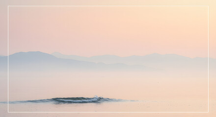 Fototapeta premium Tranquil minimalist seascape with soft pastel colors and misty mountain silhouette