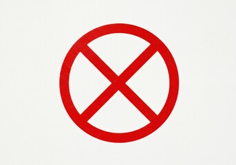 A red circle with a red x through it on a white background indicating prohibition or restriction sign