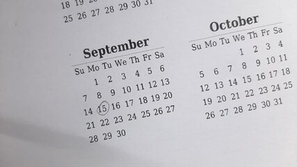 marking 15 September date on the calendar	
