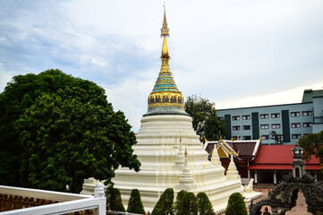 Naklejka premium Pagoda and Chapel, Lanna Architecture, Symbols of Buddhism, South East Asia at Wat Buppharam, Chiang Mai, Northern Thailand