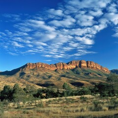 Stunning mountain range under a vibrant sky.  Vast, arid landscape