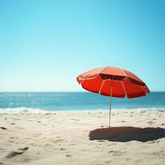 Red umbrella on the beach
