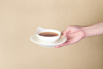 White cups and plates filled with Chinese medicine