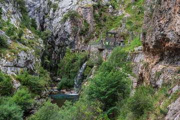 Mountain dam in the Cares gorges in Spain, with its rocky cliffs and vegetation