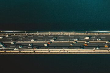 Suspension bridge and vehicle traffic in Istanbul. Aerial drone footage of vehicles moving on the Bosphorus Bridge over the Sea of â€‹â€‹Marmara in Turkiye.
