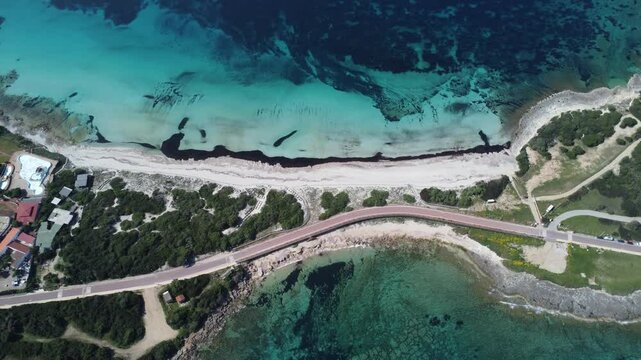 beautiful white beach of capo testa in the north of sardinia, drone view