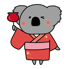 りんご飴を持っている浴衣を着たコアラ